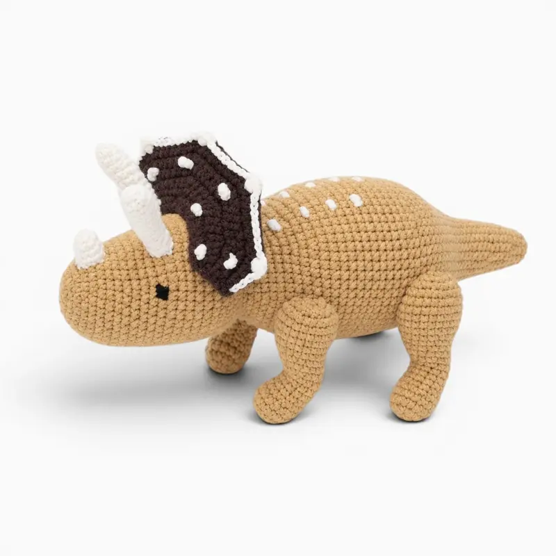 Beiges gehäkeltes Triceratops Kuscheltier