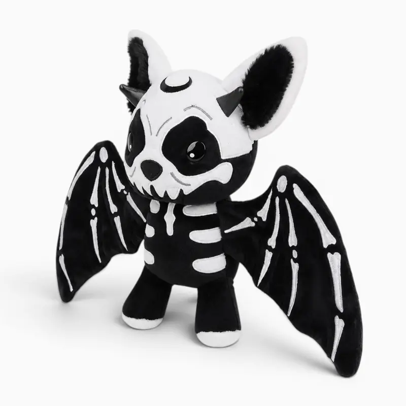 Schwarz-weißes Skelett-Fledermaus-Kuscheltier